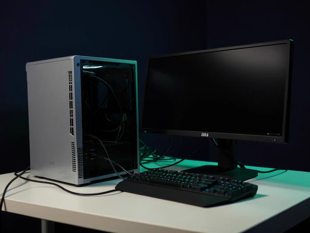 New desktop computer and monitor being set up on a clean desk